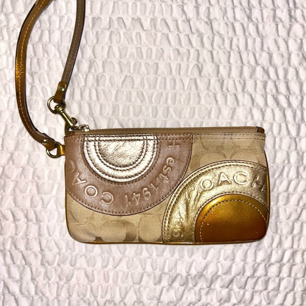 Coach Gold and Tan Clutch with Elegant Swirls